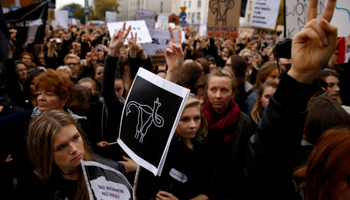 Womens’ rights campaigners demonstrate against plans for a total ban on abortion outside Law and Justice party headquarters in Warsaw in 2016 (Reuters/Kacper Pempel/File photo)