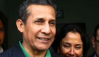 Former President Ollanta Humala and his wife Nadine Heredia before turning themselves in to police (Reuters/Guadalupe Pardo)