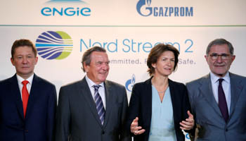 Gazprom chief Alexei Miller (L) poses with former German Chancellor Gerhard Schroeder (2ndL), Isabelle Kocher, Chief Executive Officer of French gas and power group Engie, and Gerard Mestrallet, Engie's former Chairman & CEO, now non-executive Chairman, pose in Paris, France (Reuters/Christian Hartmann)