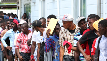 Haitians stand in line as they try to join the country's reformed military in Gressier, Haiti (Reuters/Jeanty Junior Augustin)