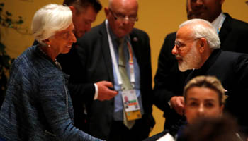 IMF Managing Director Christine Lagarde shakes hands with India's Prime Minister Narendra Modi at the G20 leaders summit in Hamburg, Germany (Reuters/Wolfgang Rattay)