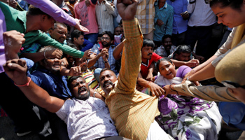 Demonstrators during a protest organised by people of India's low-caste Dalit community against what they say are increasing atrocities against the community in Ahmedabad, India, 2016 (Reuters/Amit Dave)