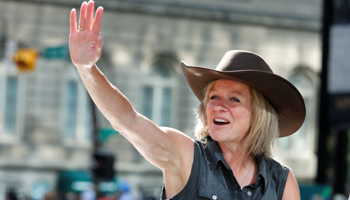 Alberta Premier Notley of the New Democratic Party waves at spectators during the Calgary Stampede Parade (Reuters/Todd Korol)