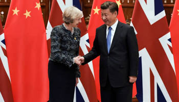 Chinese President Xi Jinping (R) and British Prime Minister Theresa May on the sidelines of the G20 Summit in September 2016 (Reuters/Etienne Oliveau)