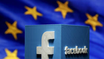 A 3D-printed Facebook logo is seen in front of the logo of the European Union (Reuters/Dado Ruvic)