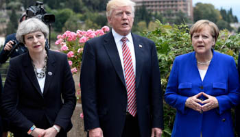 Prime Minister May, President Trump and Chancellor Merkel at the G7 Summit in Sicily, Italy (Reuters/Stephane De Sakutin)