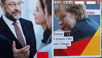 Election campaign posters for the upcoming general elections of the Christian Democratic Union party and Germany's Social Democratic Party SPD in Berlin, Germany (Reuters/Fabrizio Bensch)