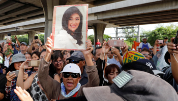 Supporters of ousted former Thai prime minister Yingluck Shinawatra at the Supreme Court in Bangkok, Thailand (Reuters/Jorge Silva)