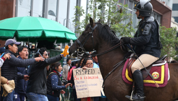 Riot police clash with striking teachers in Lima (Reuters/Guadalupe Pardo)