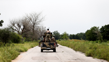 A military vehicle drives along the Konduga-Bama road in Borno state (Reuters/Afolabi Sotunde)
