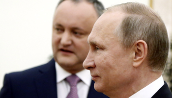 Russian President Vladimir Putin, front, meets with his Moldovan counterpart Igor Dodon at the Kremlin in Moscow, Russia (Reuters/Maxim Shipenkov)