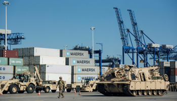 Soldiers walk near US military equipment which arrived as part of NATO mission at port in Gdansk, Poland September 13, 2017 (Agencja Gazeta/Bartosz Banka)
