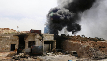 Smoke rises after an airstrike at the rebel-held village of Maar Zita in Idlib province, Syria (Reuters/Ammar Abdullah)