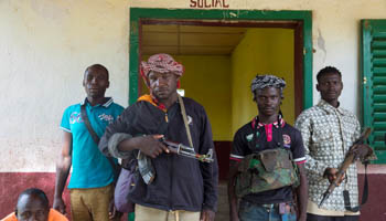 Members of an anti-Balaka group pose outside a local administration office in the town of Bocaranga, Central African Republic, April 28, 2017. (Reuters/Baz Ratner)