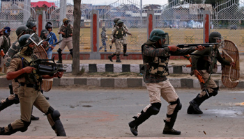 Indian policemen during a clash with protesters in Srinagar (Reuters/Danish Ismail)