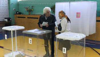 People cast their ballots during the regional governor election, in Ryazan, Russia (Reuters/Maria Tsvetkova)