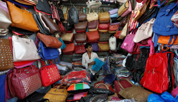 A vendor at a market in Mumbai, India (Reuters/Danish Siddiqui)