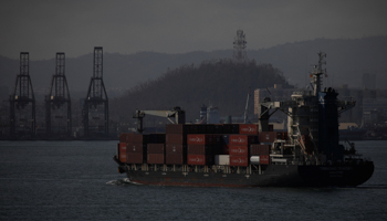 A cargo ship is seen in front of a port in San Juan, Puerto Rico (Reuters/Carlos Garcia Rawlins)