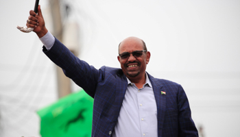 Sudan's President Omar al-Bashir waves to supporters during a visit to the Darfur region (Reuters/Mohamed Nureldin Abdallah)