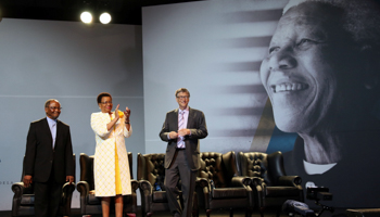 Bill Gates, right, about to give the 14th Nelson Mandela Annual Lecture in Pretoria in July 2016 (Reuters/Siphiwe Sibeko)