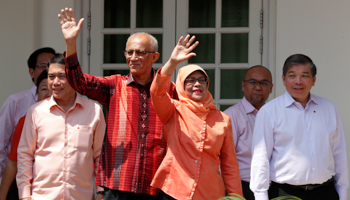 Former speaker of Singapore's parliament, Halimah Yacob with her husband Mohammed Abdullah Alhabshee (Reuters/Edgar Su)