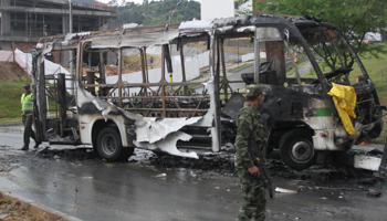 A passenger bus, which was allegedly burnt by 'Los Urabenos' gang members, in Medellin, Colombia (Reuters/Fredy Builes)