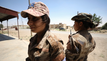 Syrian Democratic Forces fighters in western Raqqa province, Syria (Reuters/Rodi Said)