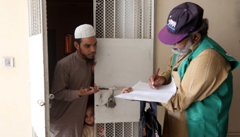 A census enumerator at work in Karachi (Reuters/Akhtar Soomro)
