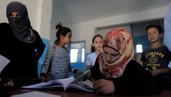 Schoolchildren wait to register in school in Hazema North Raqqa, Syria (Reuters/Zohra Bensemra)
