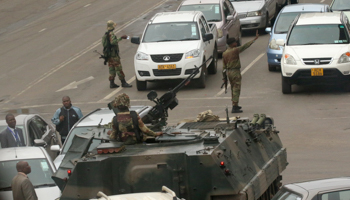 Military vehicles and soldiers patrol the streets in Harare, Zimbabwe (Reuters/Philimon Bulawayo)