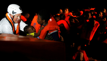 Migrants are seen during rescue operation in the Mediterranea Sea (Reuters/Yara Nardi/Italian Red Cross press office)