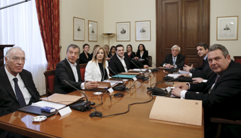 Pasok leader Fofi Gennimata,3rd from left, between To Potami leader Stavros Theodorakis, 2nd from left, and Syriza Prime Minister Alexis Tsipras, 4th from left, with other party leaders at the presidential palace, March 2016 (Reuters/Alkis Konstantinidis)