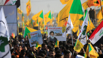 Supporters of the Popular Mobilization Forces gather during the celebration of the final victory over the Islamic State at the Wadi al-Salam cemetery, in Najaf, Iraq December 10, 2017 (Reuters/Alaa Al)