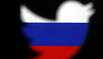 The Twitter logo shown in the colours of the Russian flag (Reuters/Dado Ruvic)