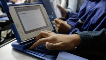 Uruguayan students with state-provided laptops (Reuters/Andres Stapff)