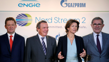 Left to right, Gazprom chief Alexei Miller, former German Chancellor Gerhard Schroeder, Isabelle Kocher, Chief Executive Officer of French gas and power group Engie, and Gerard Mestrallet, Engie's non-executive Chairman in Paris, France (Reuters/Christian Hartmann)