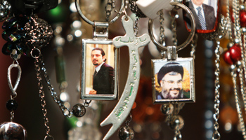 Pictures of Lebanon's Hezbollah leader Hassan Nasrallah, right, and Prime Minister Saad al-Hariri on key rings at a gift shop in the port city of Sidon, southern Lebanon, January 19, 2011 (Reuters/Ali Hashisho)