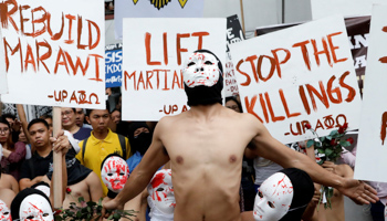 Protesters in Quezon City calling for the lifting of martial law in Mindanao (Reuters/Dondi Tawatao)