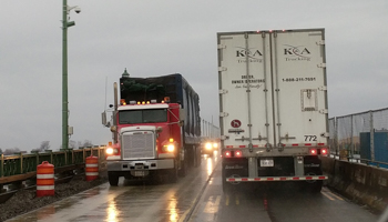 Cross-border transport trucks on the Peace Bridge at the Canada-US border in Buffalo, New York (Reuters/Hyungwon Kang)