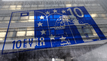 A placard featuring an Euro bank note is seen outside the money museum in Frankfurt, Germany (Reuters/Kai Pfaffenbach)