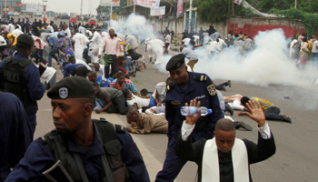 Police fire tear gas to disperse Catholic protestors, Kinshasa, January 21 (Reuters/Kenny Katombe)