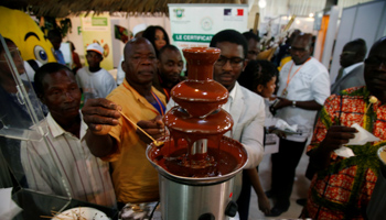 A man trying chocolate during a ceremony marking the start of the 2017-18 growing season in October, Abidjan (Reuters/Luc Gnago)