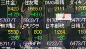Electronic stock quotation board outside a brokerage in Tokyo (Reuters/Toru Hanai)