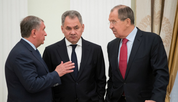 Russian Foreign Minister  Sergey Lavrov, right, with Rosneft head Igor Sechin, left, and Defence Minister Sergey Shoygu (Reuters/Pavel Golovkin)