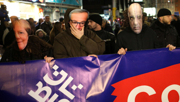 Anti-corruption protesters in masks depicting, left to right, German Chancellor Angela Merkel, European Commission President Jean-Claude Juncker and Bulgarian Prime Minister Boyko Borissov during a demonstration in Sofia, January 11 (Reuters/Stoyan Nenov)