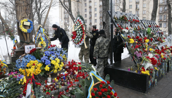 On the fourth anniversary of the Maidan uprising in Kyiv, the 100-plus people who died are remembered (Reuters/Valentyn Ogirenko)