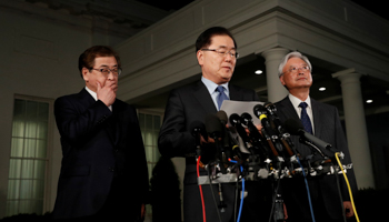 South Korea's National Security Office head Chung Eui-yong, center, National Intelligence Service chief Suh Hoon, left, and South Korean Ambassador to the US Cho Yoon-je, make an announcement about North Korea and the Trump administration outside of the West Wing at the White House in Washington, March 8, 2018 (Reuters/Leah Millis)