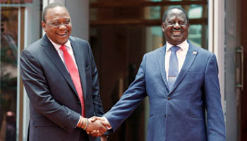 President Uhuru Kenyatta and opposition leader Raila Odinga hold a joint press conference in Nairobi, Kenya, on March 9, 2018. (Reuters/Thomas Mukoya)