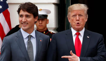 US President Donald Trump welcomes Canada's Prime Minister Justin Trudeau before their meeting about the NAFTA trade agreement in Washington in 2017. (Reuters/Jonathan Ernst)