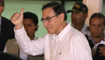 Incoming President Martin Vizcarra arriving in Lima from Ottawa to be sworn in (Reuters/Guadalupe Pardo)